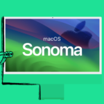 Man looking through binoculars at computer screen with "Sonoma" written on it.