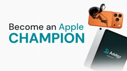 Hero graphic with the headline "Become an Apple CHAMPION," accompanied by an orange iPhone with a sketch-style illustrated figure climbing out of it and a silver iPad displaying the Addigy logo on a teal screen.