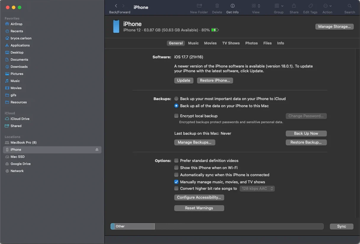 iPhone plugged into macOS device via USB