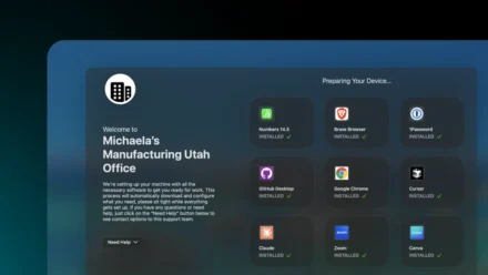 Addigy Assist in Apple MDM during macOS enrollment: End-user welcome screen for Michaela at Smith's Manufacturing with Prebuilt Apps like Numbers 14, Firefox, Google Chrome, Zoom, and Canvas installing in real-time for zero-touch device onboarding.