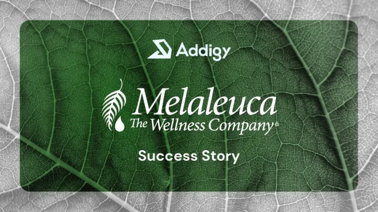 Addigy and Melaleuca: The Wellness Company Success Story graphic, featuring both logos over a close-up of a green leaf with visible veins against a grey leafy background.